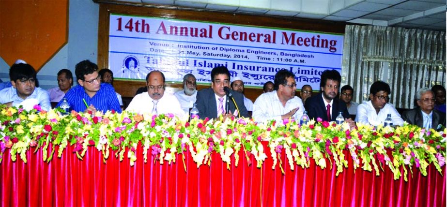 Emdadul Haque Chowdhury, Chairman of Takaful Islami Insurance Ltd, presiding over the 14th Annual General Meeting of the company held at a city auditorium recently. The AGM approves 15percent stock dividend for its shareholders for the year 2013.