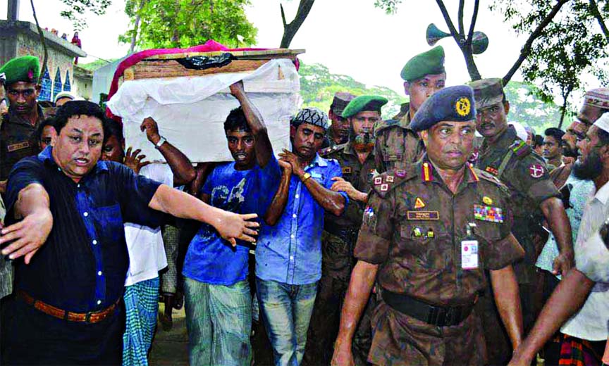 BGB Nayek Mizanur Rahman's body being taken to his village home at Debidwar in Comilla on Monday. He was killed recently by Mayanmar BGP fiiring in border.