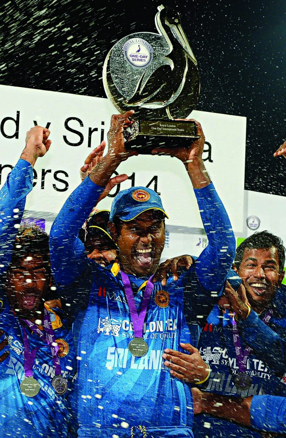 Angelo Mathews holds the series trophy aloft after the 5th ODI between Sri Lanka and England at Edgbaston on Tuesday.