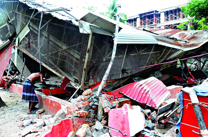 Dhaka South City Corporation authority evicted illegal structures at Road No-10 in city's Dhanmondi Residential Area on Thursday.