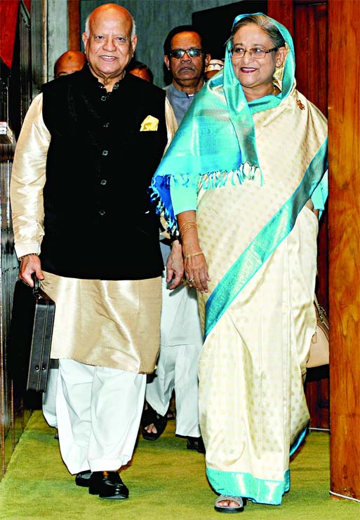 Prime Minister Sheikh Hasina and Finance Minister Abul Maal Abdul Muhith entering the house on Thursday (5th June '14) Mr Muhith carrying the budget papers in traditional brief case.