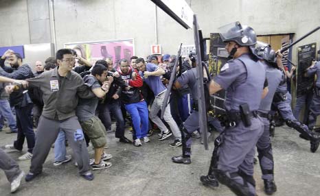 Subway train operators, along with some activists, clash with police at the Ana Rosa metro station on the second day of their metro strike in Sao Paulo, Brazil.