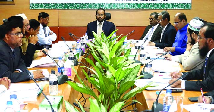 Md Eskandar Ali Khan, Chairman of the Executive Committee of Islami Bank Bangladesh Limited poses with participants of an orientation programme for newly recruited assistant officers of the bank at its auditorium on Thursday. Mohammad Abdul Mannan, Manag