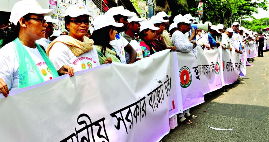 Bangladesh Union Parishad Forum formed a human chain in front of the Jatiya Press Club demanding budget for Local Govt on Saturday.