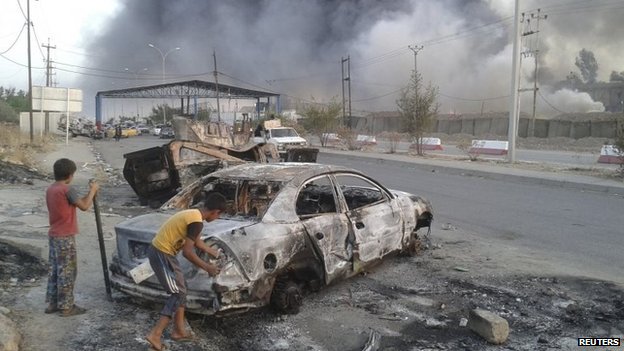 Dozens of vehicles were destroyed on roads in and around Mosul