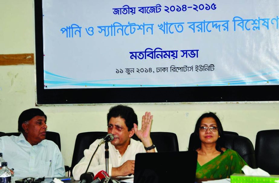 Economist Abul Barakat speaking at an opinion sharing meeting on 'National Budget 2014-15: Allocation in Sanitation Sector' at Dhaka Reporters' Unity auditorium on Wednesday.