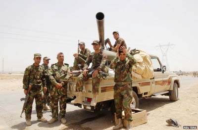 Kurdish fighters outside Kirkuk on Wednesday.