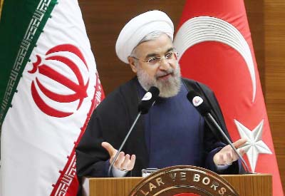Iranian President Hassan Rouhani addresses a Turkish-Iranian business forum in Ankar.