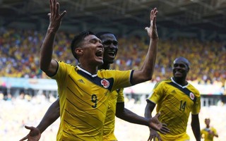 Colombia's Teofilo Gutierrez (front) celebrates his goal against Greece during their 2014 World Cup Group C soccer match at the Mineirao stadium in Belo Horizonte June 14, 2014. Credit: Reuters