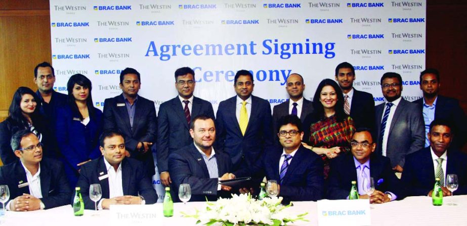 Daniel Muhor, General Manager of The Westin Dhaka and Firoz Ahmed Khan, Head of Retail Banking Division of BRAC Bank Limited, sign an agreement on Saturday to facilitate BRAC Bank Premium Banking customers and Platinum Credit Cardholders for free buffet a