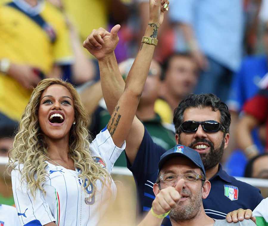 Fanny Neguesha, fiancee of Mario Balotelli of Italy cheers in the crowd during the 2014 FIFA World Cup Brazil Group D match between England and Italy at Arena Amazonia in Manaus, Brazil on Saturday