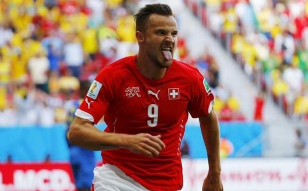 Switzerland's Haris Seferovic celebrates after scoring a goal to defeat Ecuador in their 2014 World Cup Group E soccer match at the Brasilia national stadium in Brasilia, June 15, 2014. Credit: Reuters