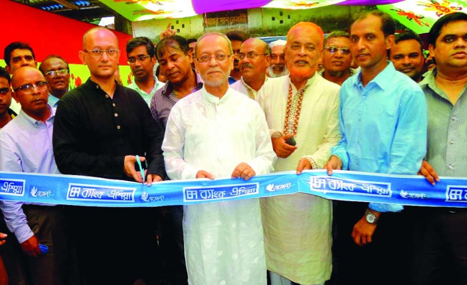 Rumee A Hossain, Chairman of Bank Asia Board Executive Committee inaugurating two agent booths of the bank at Teuri and Panpara Bazar of Ramganj upazila in Laxmipur on Sunday.