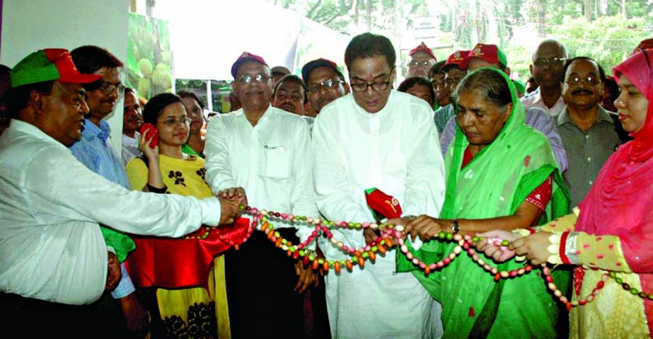 Local Government Rural Development and Cooperatives Minister Syed Ashraful Islam inaugurating 'Fruits bearing trees plantation programme' at Farmgate in the city on Monday.