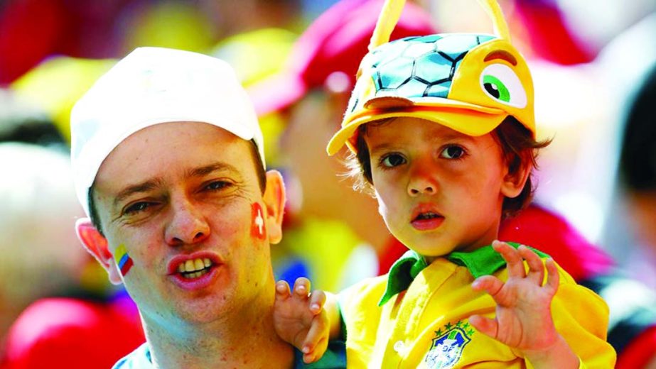 A young fan looks on during the 2014 FIFA World Cup Brazil Group E match between Switzerland and Ecuador at Estadio Nacional on Sunday in Brasilia, Brazil.