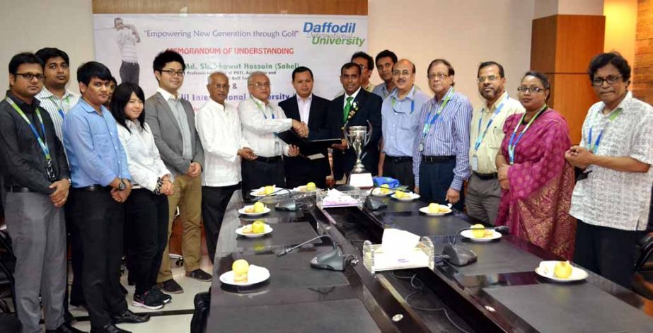 Prof Dr M Lutfar Rahman, Vice Chancellor, Daffodil International University exchanging MoU with golfer Md. Shakhawat Hossain (Sohel) recently. Md. Sabur Khan, Chairman, Board of Trustees of the University and other high officials are seen in the picture.