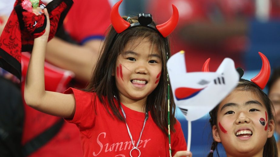 South Korea fans show their support prior to the 2014 FIFA World Cup Brazil Group H match between Russia and South Korea at Arena Pantanal in Cuiaba, Brazil on Tuesday.