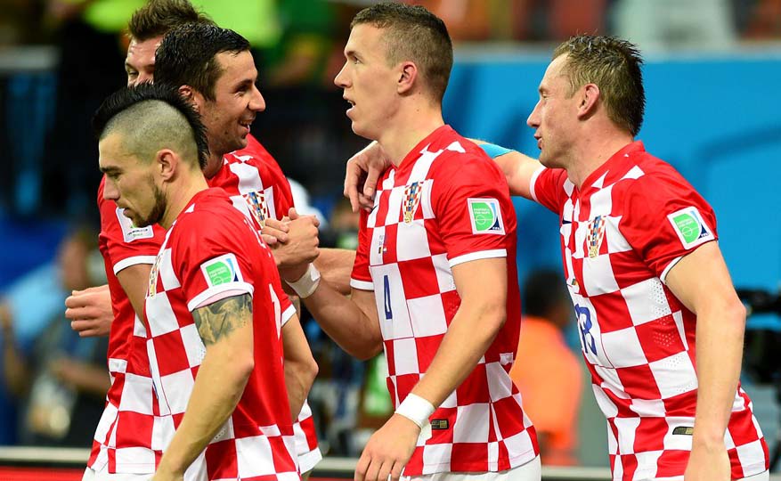 Ivan Perisic of Croatia celebates scoring his team's second goal with his teammates during the 2014 FIFA World Cup Brazil Group A match between Cameroon and Croatia at Arena Amazonia on Wednesday in Manaus, Brazil.