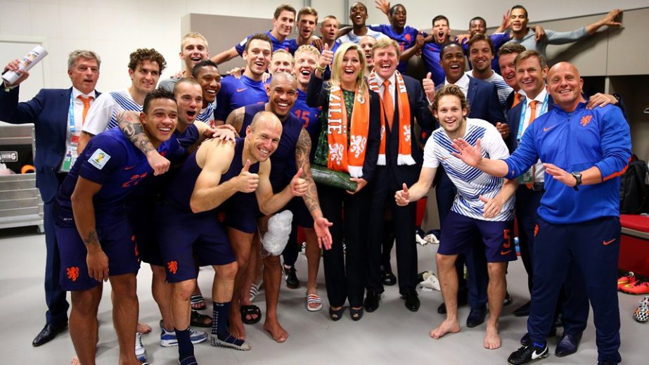 In this handout image supplied by the FIFA, King Willem-Alexander of the Netherlands and Queen Maxima of the Netherlands celebrate with the Netherlands team after the 2014 FIFA World Cup Brazil Group B match between Australia and Netherlands at Estadio Be