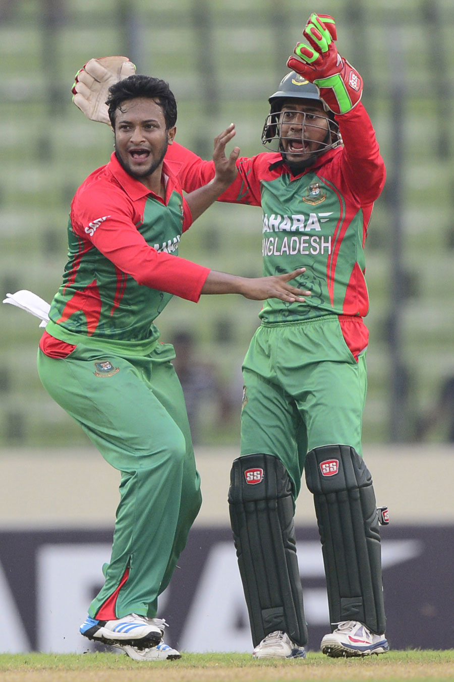 Shakib Al Hasan exults after having Suresh Raina caught behind during the 3rd ODI between Bangladesh and India at Mirpur in the city on Thursday.