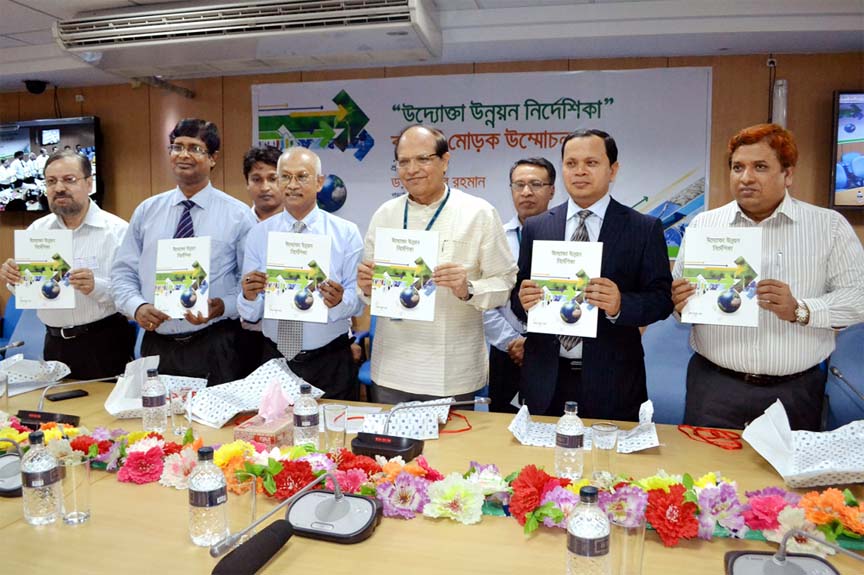 Bangladesh Bank Governor Dr Atiur Rahman unveiling a book namely "Hand Book of Entrepreneurship Development" written by Md. Sabur Khan, Chairman, Daffodil International University at a ceremony in the city on Thursday.