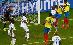Ecuador's Enner Valencia (top R) heads the ball to score the team's second goal against Honduras during their 2014 World Cup Group E soccer match at the Baixada arena in Curitiba, June 20, 2014. Credit: Reuters