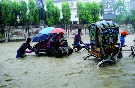 Victims of rain being taken to safer places on Saturday.