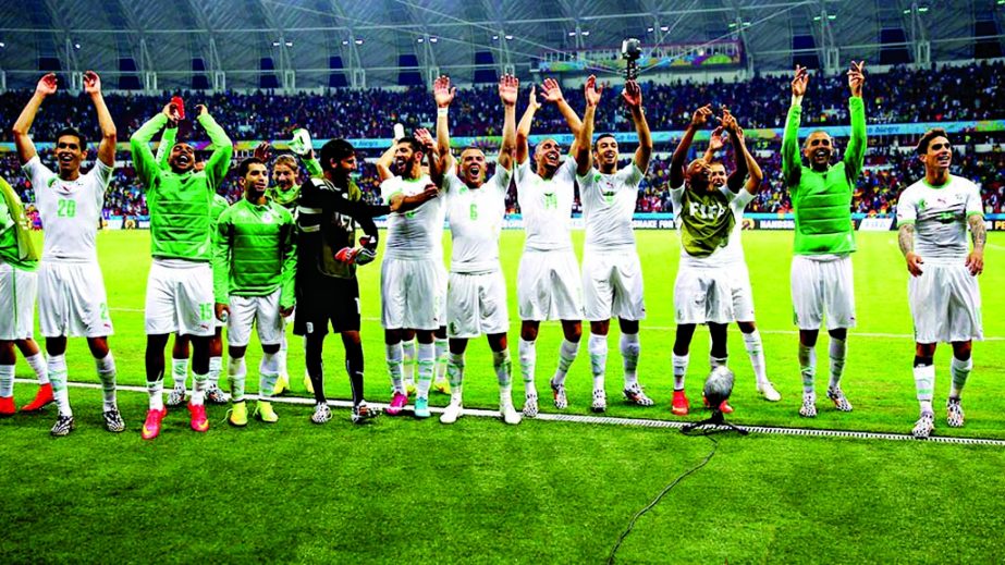 Algerian players celebrate the 4-2 win after the 2014 FIFA World Cup Brazil Group H match between Korea Republic and Algeria at Estadio Beira-Rio on Sunday in Porto Alegre, Brazil.