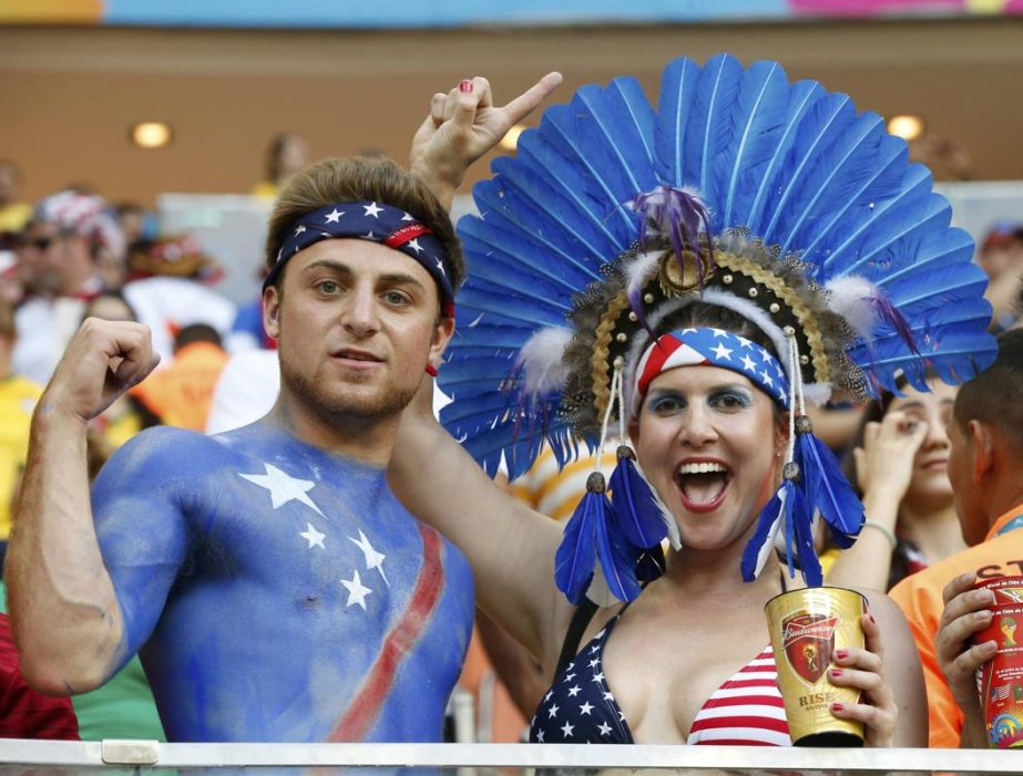US fans cheer during the 2014 World Cup G soccer match between Portugal and the US at the Amazonia arena in Manaus on Sunday.