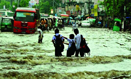 Braving the stagnant sea of water these tiny-tots steadily managed to reach near their school at Arambagh on Sunday morning, but they were scared soon when vehicles from different directions stood on their way. A witness to this situation wanted to know w