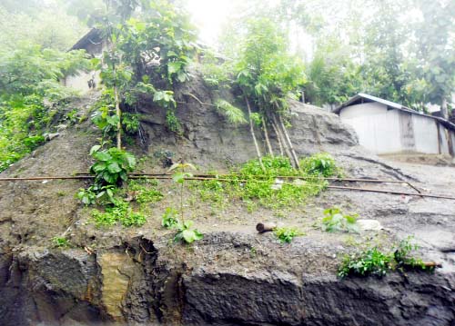 People still living in hill-pocket in Bandarban though district administration has repeatedly asked them to leave the risky area. This picture was taken from Islampur area in Bandarban on Monday.