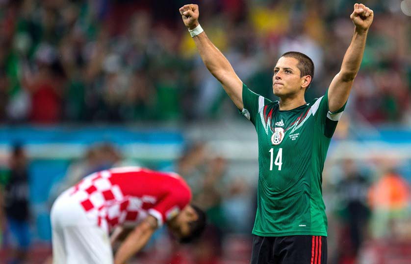 Javier Hernandez of Mexico celebrates scoring his team's third goal during the 2014 FIFA World Cup Brazil Group A match between Croatia and Mexico at Arena Pernambuco in Recife, Brazil on Monday.
