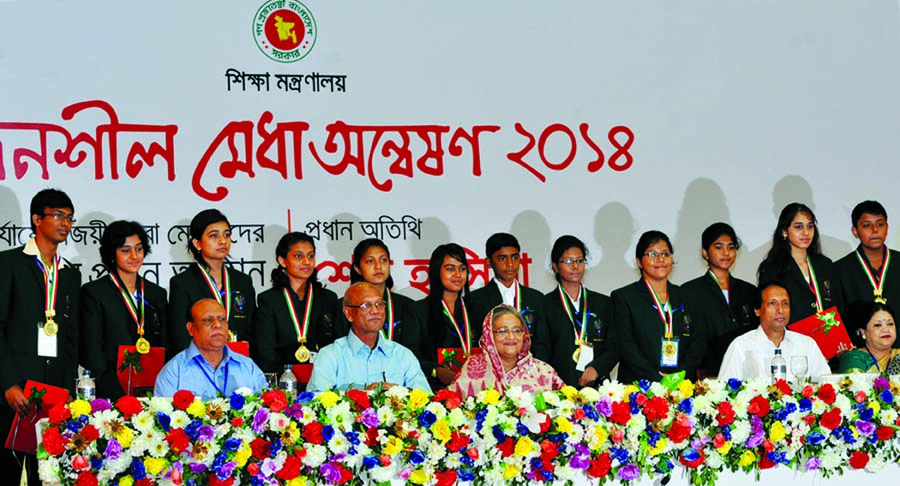 Prime Minister Sheikh Hasina along with other distinguished guests poses for photograph with the winners of Creative Talent Hunt Competition at Bangabandhu International Conference Center in the city on Wednesday.