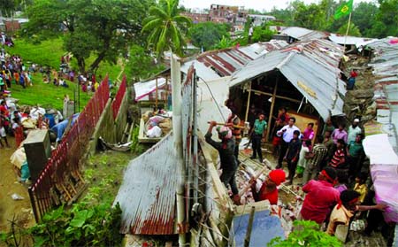 People residing at hill areas risking their lives being evicted by the Chittagong District administration authority. This photo was taken from city's Lalkhan Bazar area on Wednesday.