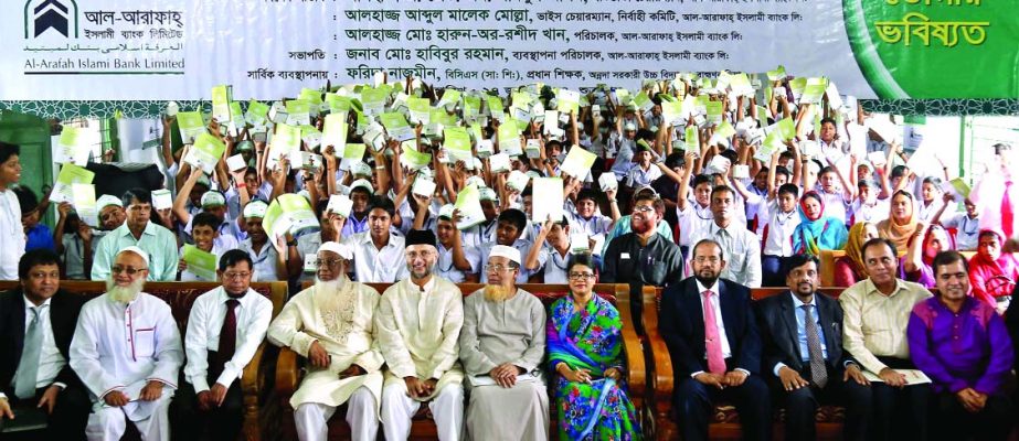 Badiur Rahman, Chairman of Al-Arafah Islami Bank Limited, inaugurating 'School Banking Conference - 2014' with the slogan 'Tomar haatei tomar vobisshot' (Your future is in your hand) at Annada Government High School, Brahmanbaria on Friday.