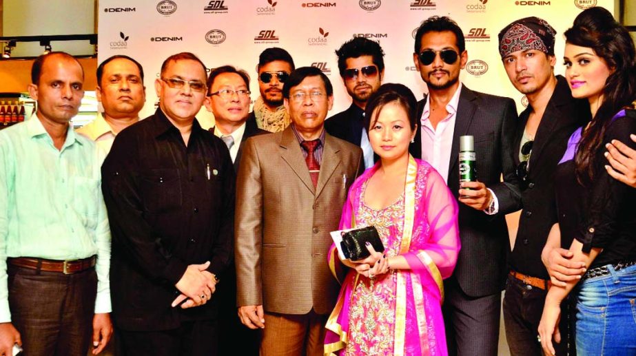 Alan Loo, General Manager of Mustafa Mart Bangladesh and Managing Director of SDL Group, Tonya Tan, pose for photograph after inaugurating the launching programme of world class perfume brands "Brut" & "Denim" at Bashundhara City Shopping Complex on F