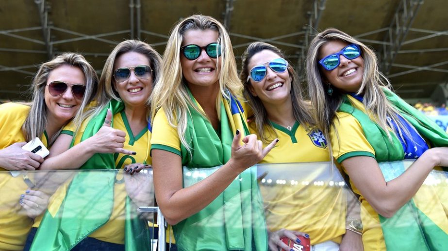 Brazil fans enjoy the atmosphere prior to the 2014 FIFA World Cup Brazil round of 16 match between Brazil and Chile at Estadio Mineirao in Belo Horizonte, Brazil on Saturday.