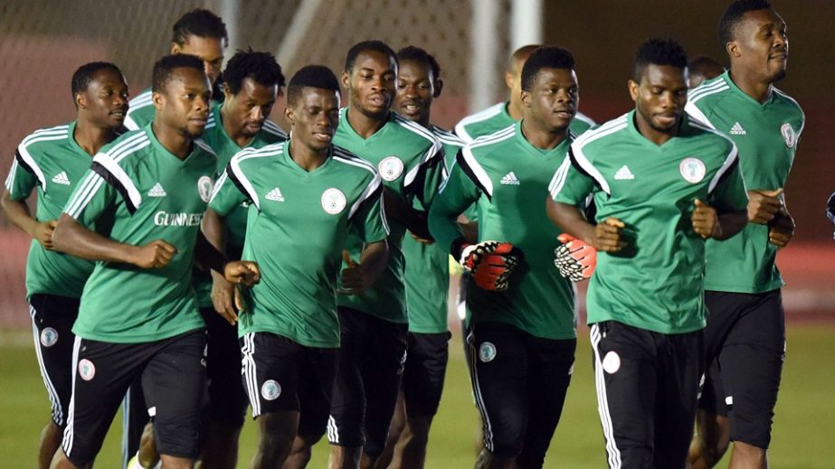 Nigeria's goalkeeper Chigozie Agbim (C, wearing gloves) and his team-mates take part in a training session in Brasilia, on Friday prior to their round of 16 match against France on June 30 during the 2014 FIFA World Cup in Brazil.