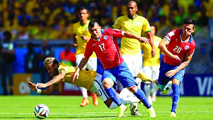 Gary Medel of Chile challenges Neymar of Brazil during the 2014 FIFA World Cup Brazil round of 16 match between Brazil and Chile at Estadio Mineirao in Belo Horizonte, Brazil on Saturday.