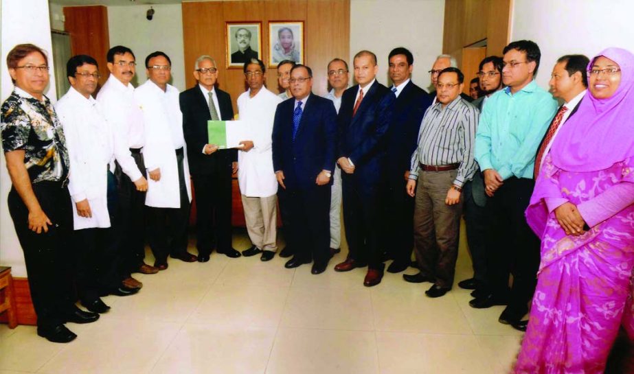 As a part of Corporate Social Responsibility Hafiz Ahmed Mazumder, Chairman of the Board of Directors of Pubali Bank Ltd handing over a cheque of Tk43,00,000- to Dr Pran Gopal Datta, Vice-Chancellor of Bangabandhu Sheikh Mujib Madical University for purc