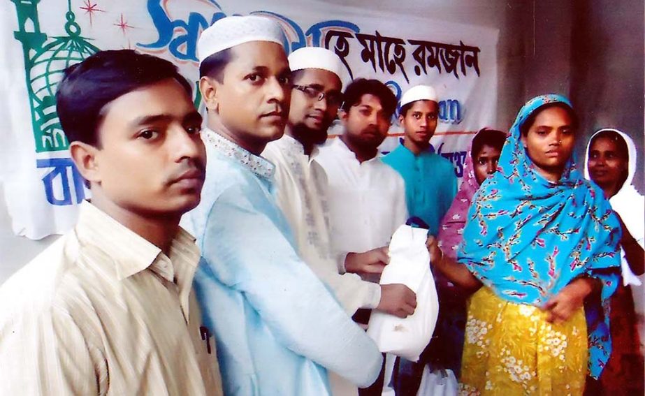 Bangladesh Welfare Society distributed Iftar items among the distressed in Chittagong yesterday.