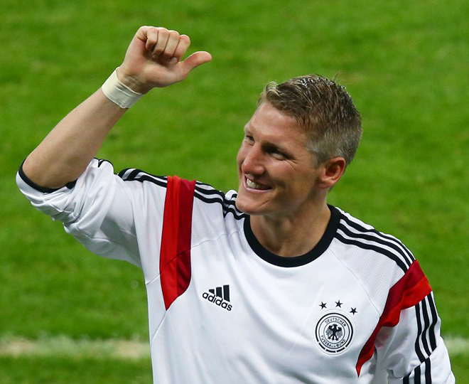 Bastian Schweinsteiger of Germany acknowledges the fans after defeating Algeria 2-1 during the 2014 FIFA World Cup Brazil Round of 16 match between Germany and Algeria at Estadio Beira-Rio in Porto Alegre, Brazil on Monday.