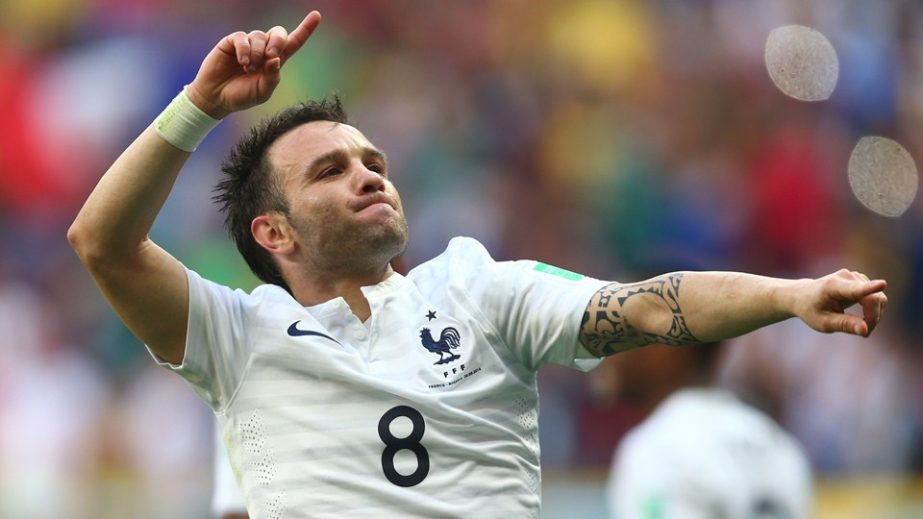 Mathieu Valbuena of France celebrates his team's second goal on an own goal by Joseph Yobo of Nigeria (not pictured) during the 2014 FIFA World Cup Brazil Round of 16 match between France and Nigeria at Estadio Nacional in Brasilia, Brazil on Monday.
