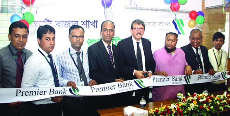 Dewan Anwarul Latif and AKM Shamsuddin Deputy Managing Directors of Premier Bank Limited inaugurating two new branches of the bank at Atibazar, Keraniganj and Kali-bari Bazar, Araihajar, Narayanganj recently.