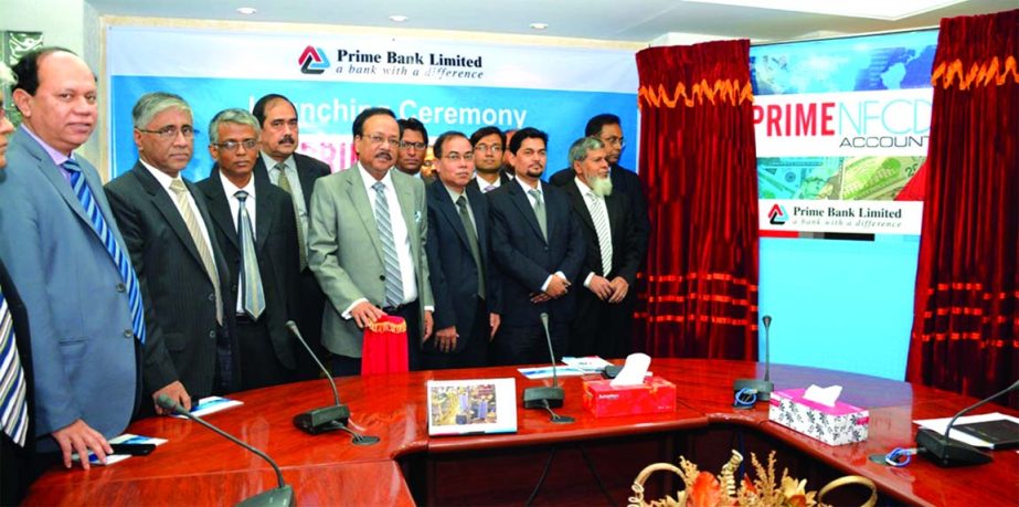 Managing Director of Prime Bank Limited Md Ehsan Khasru inaugurating the bank's "Prime NFCD Account", a special foreign currency account which is basically a fixed term deposit at its Head Office on Wednesday.