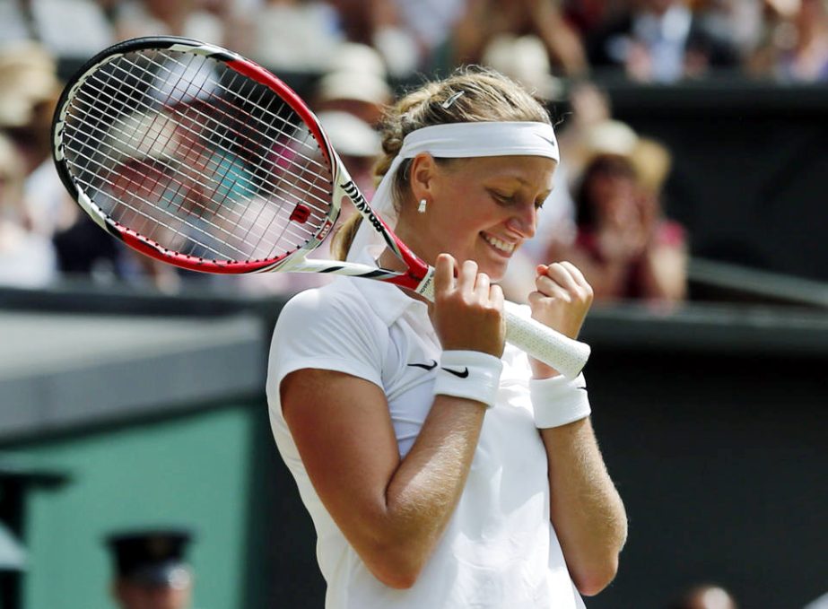 Petra Kvitova of Czech Republic celebrates after defeating Lucie Safarova of Czech Republic in their women's singles semifinal match at the All England Lawn Tennis Championships in Wimbledon, London on Thursday.