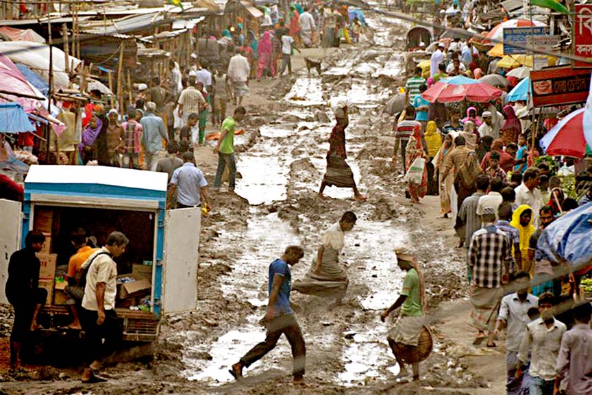 Pothole-strewn Mukti Swarani Road in the city's Jatrabari falls the pedestrians in difficulties to use the road. But the authority concerned remains idle to repair the road. The snap was taken on Friday.