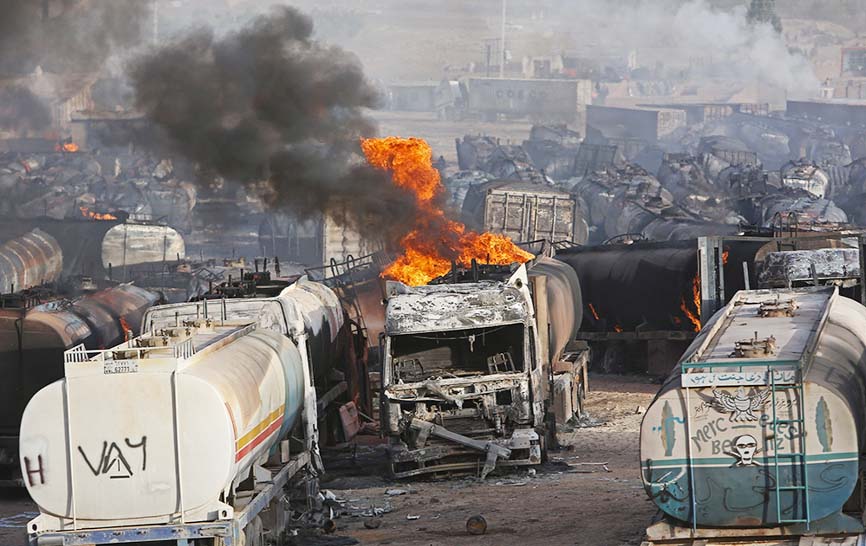 Flames rise from oil tankers after an attack claimed by Taliban militants on the outskirts of Kabul, Afghanistan.