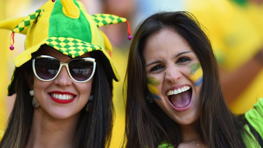 Brazil fans enjoy the atmosphere prior to the 2014 FIFA World Cup Brazil quarter final match between Brazil and Colombia at Castelao in Fortaleza, Brazil on Friday.