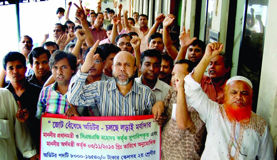 Auditors staged a demonstration in front of the Audit Bhaban in the city on Monday with a call to promote their rank into second class gazetted officer.